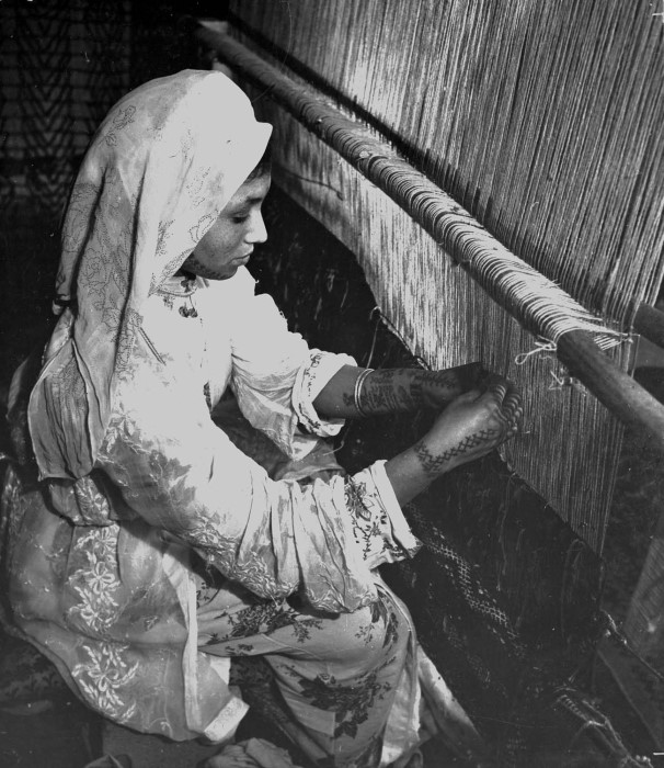 Berber weaving a carpet in the Middle Atlas 1955