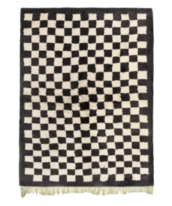 Dama black and white rug with checkered design, handmade from wool by Berber artisans in Morocco