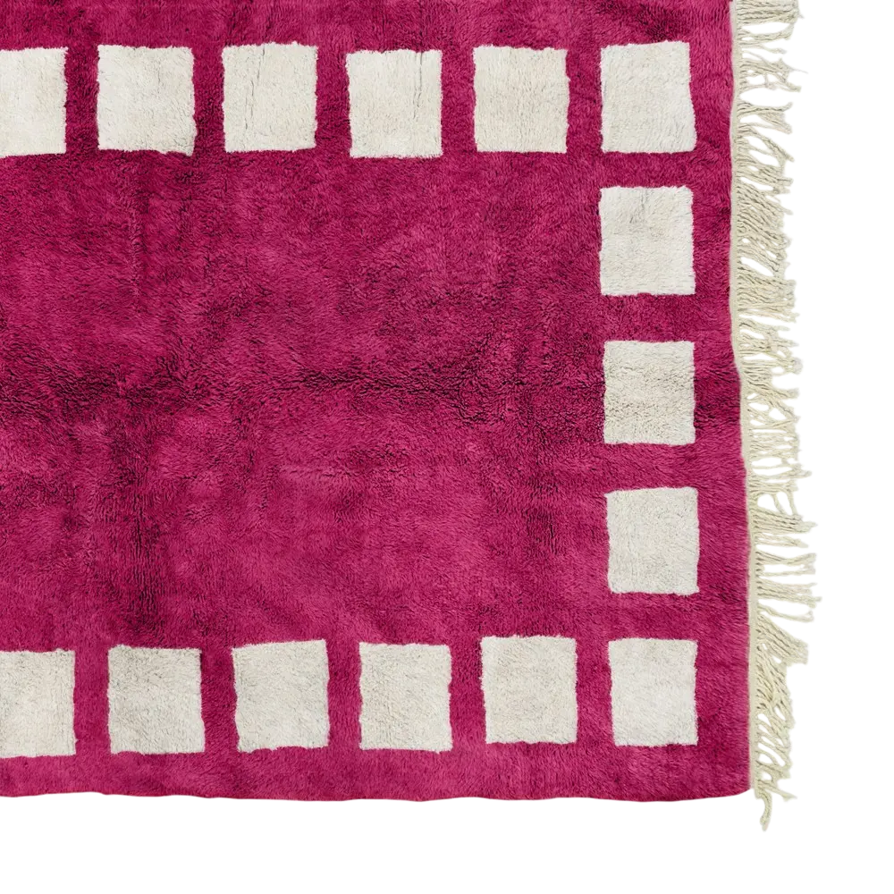 Atlas Bloom pink and white Moroccan wool rug with geometric border